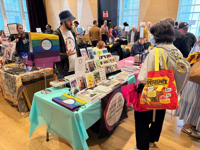 Attendees browse the books on display at the Rainbow Book Fair.