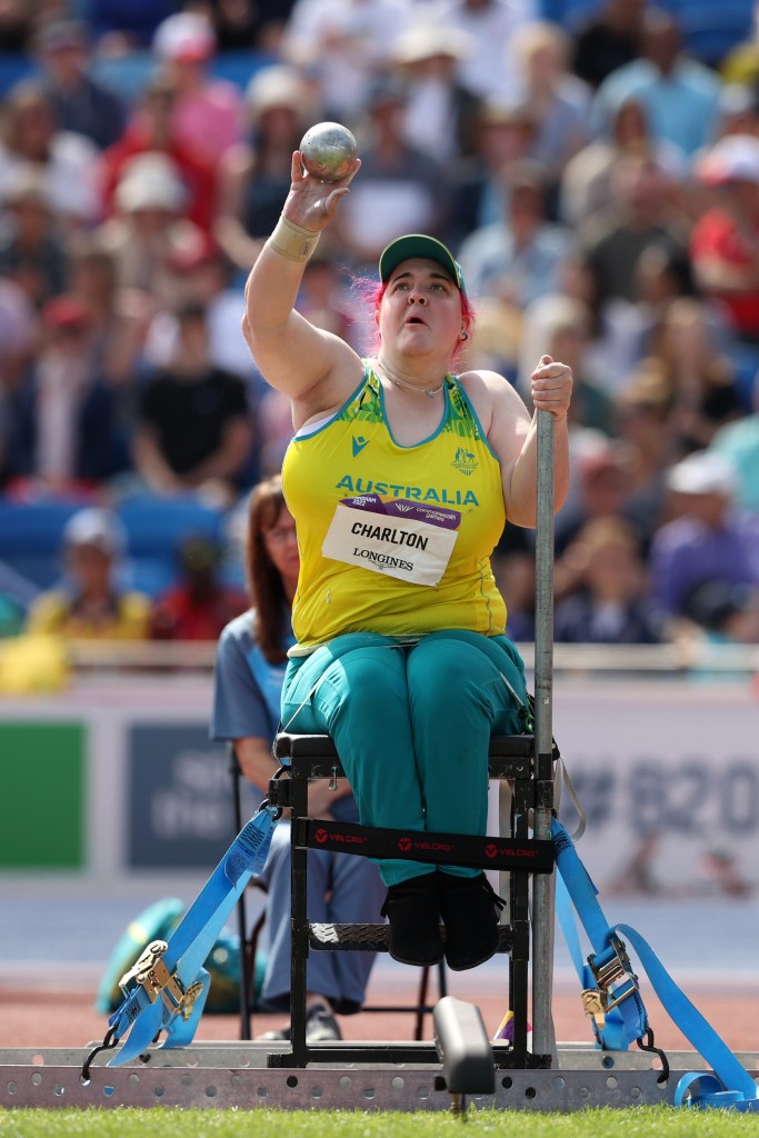 Julie Charlton competes in the shot put.