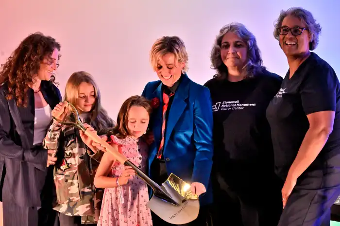 Brandi Carlile (center )and her wife Catherine (left) and two children stand with Diana Rodriguez and Ann Marie Gothard.
