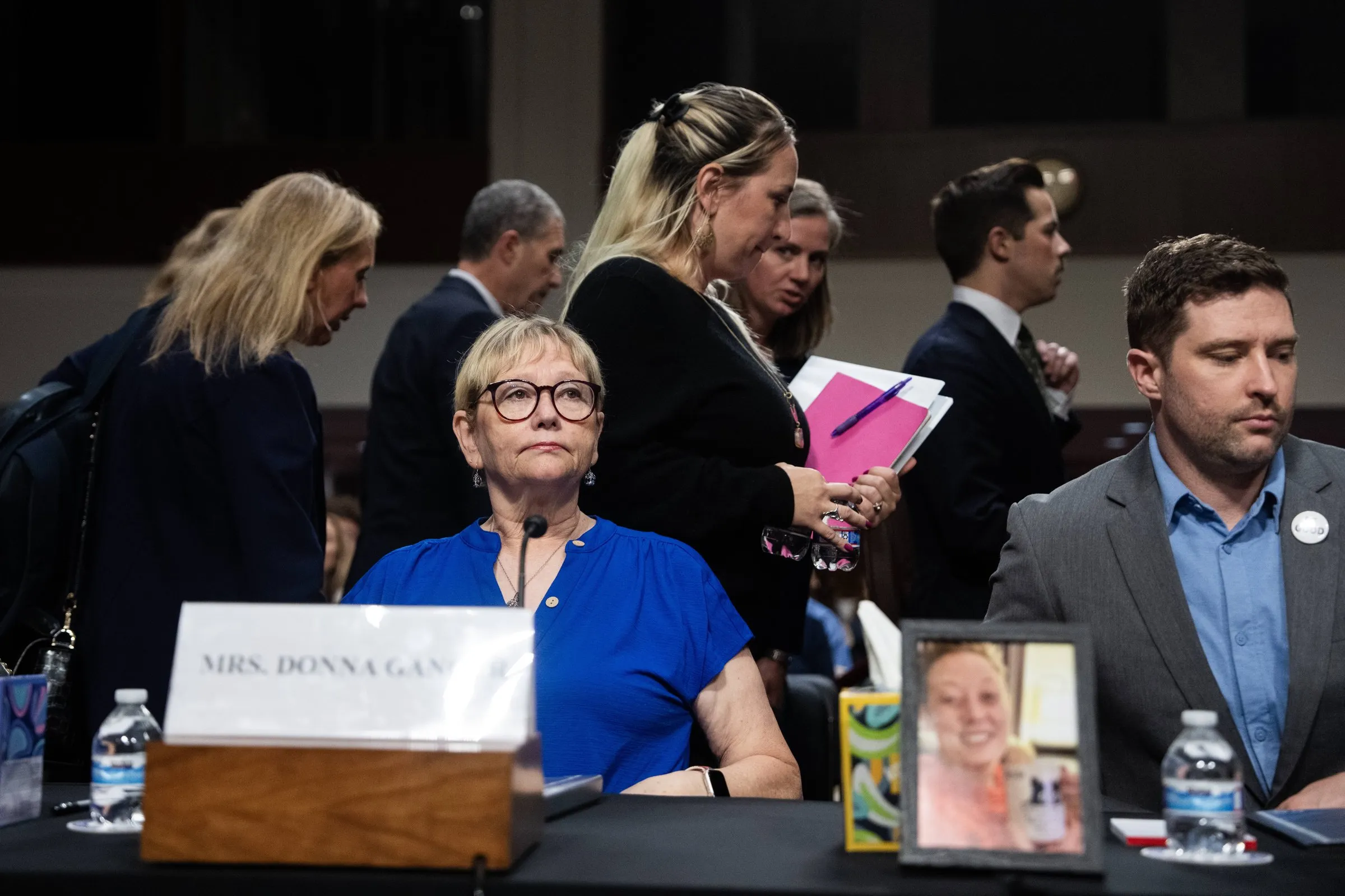 Donna and Brent Ganger, the mother and brother of Renee Nicole Macklin Good, arrive for a bicameral forum 